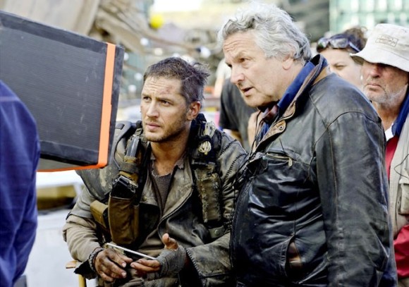 Tom Hardy and George Miller review footage on the set of Mad Max: Fury Road